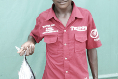 Maldivain-boy-with-fish-at-market